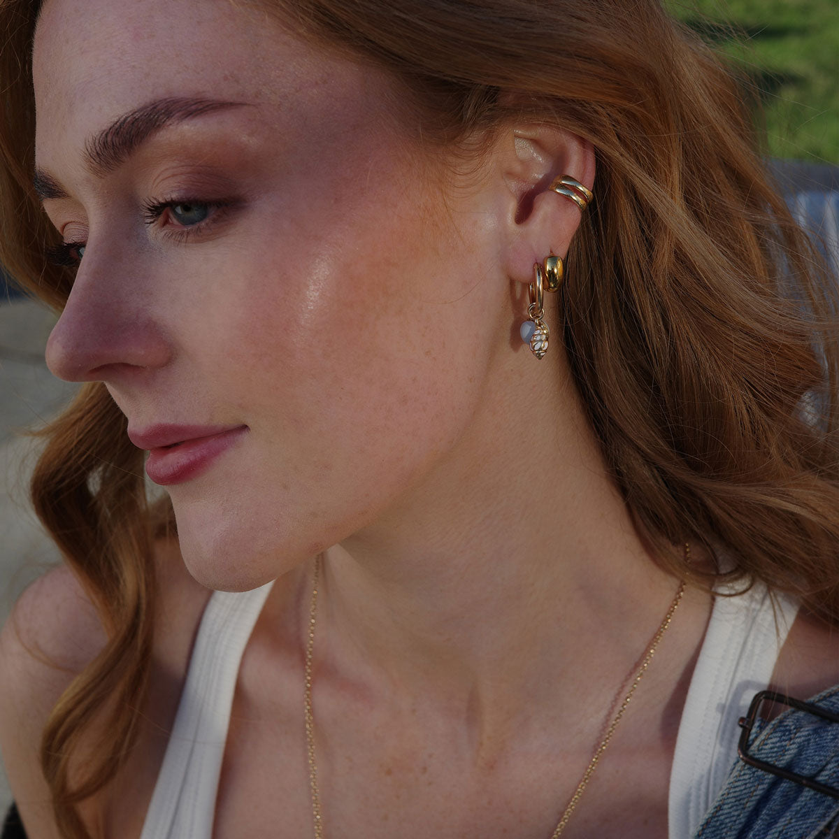 Örhängen med snäckformad berlock, A&C Oslo