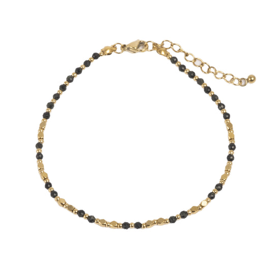 Armband med små svarta stenar och guld, A&C Oslo